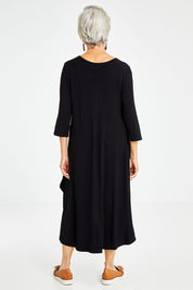 Model Elise wearing size S of the 3/4 Sleeve Bamboo Maxi Dress in colour Black (Black), from the back