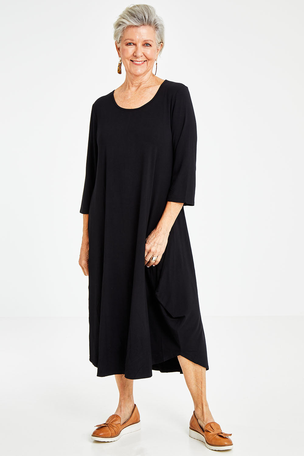 Model Elise wearing size S of the 3/4 Sleeve Bamboo Maxi Dress in colour Black (Black), from the front, showing the whole outfit