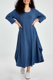 Model Bernadette wearing size S of the 3/4 Sleeve Bamboo Maxi Dress in colour Denim (Blue), from the front, cropped image