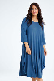 Model Laura wearing size L of the 3/4 Sleeve Bamboo Maxi Dress in colour Denim (Blue), from the front, cropped image