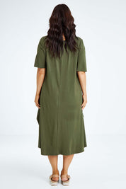 Model Laura wearing size L of the Half Sleeve Bamboo Maxi Dress in colour Olive (Green), from the back