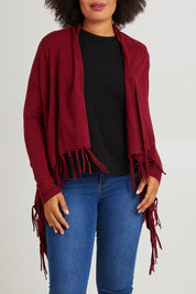 Model Olivia wearing size S of the Long Sleeve Knit Poncho in colour Burgundy (Red), from the front, cropped image