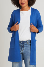 Model Olivia wearing size S of the Long Sleeve Wool Blend Cardigan in colour Denim (Blue), from the front, cropped image