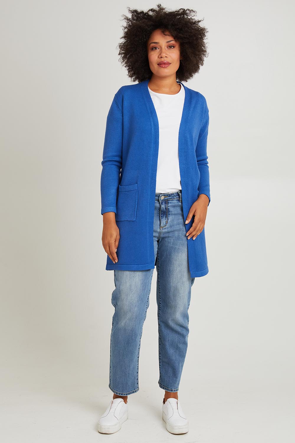 Model Olivia wearing size S of the Long Sleeve Wool Blend Cardigan in colour Denim (Blue), from the front, showing the whole outfit