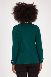 Model Olivia wearing size S of the Long Sleeve Sweater in colour Forest (Green), from the back