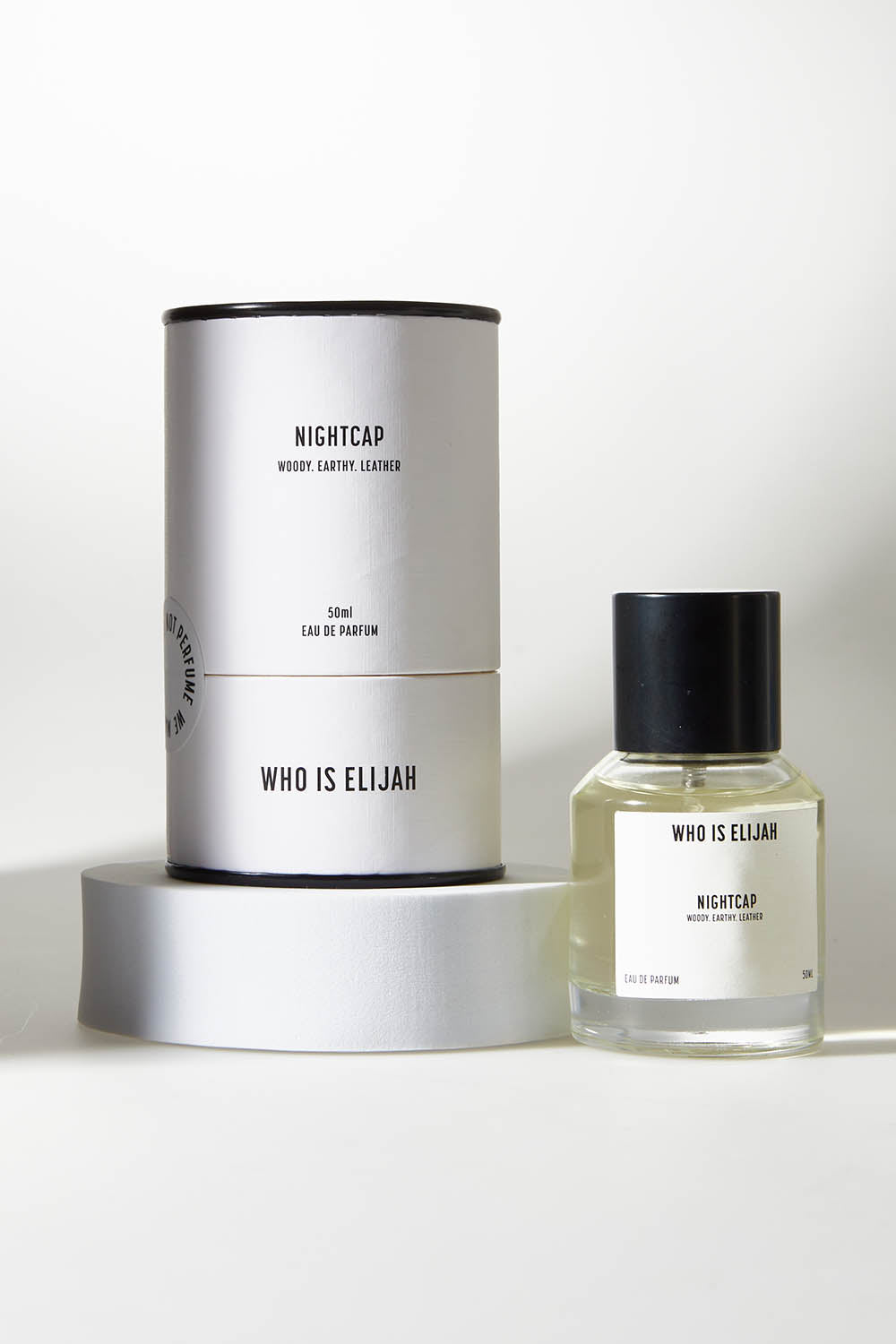 A model wearing size OneSize of the Nightcap Eau De Parfum 50ML in colour Nightcap (White), from the front, showing the whole outfit