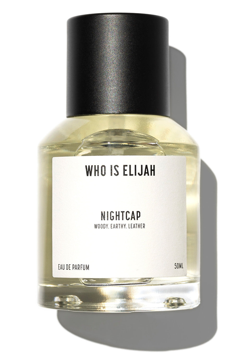 A model wearing the Nightcap Eau De Parfum 50ML in colour Nightcap (White), from the front, showing the whole outfit