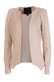 Product shot of the Persuit Jacket in colour Cream, from the front