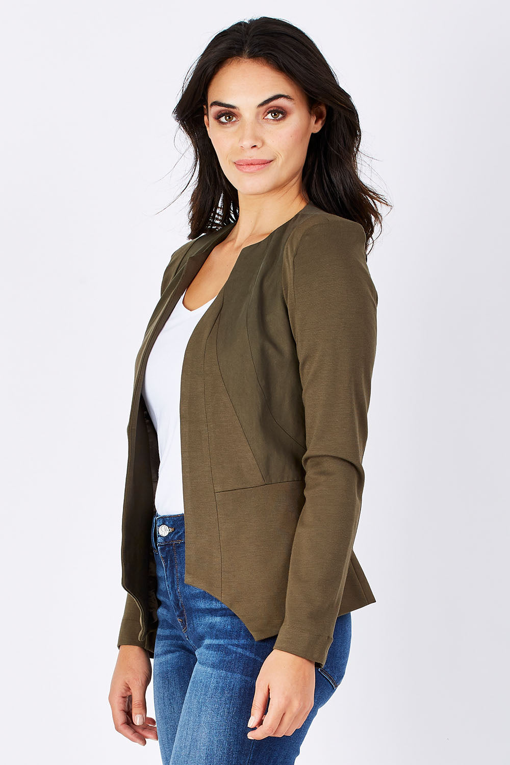 Model Monika wearing the Persuit Jacket in colour Khaki (Green), from the front, cropped image