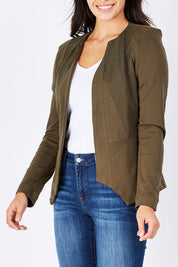 Model Monika wearing the Persuit Jacket in colour Khaki (Green), from the front, cropped image