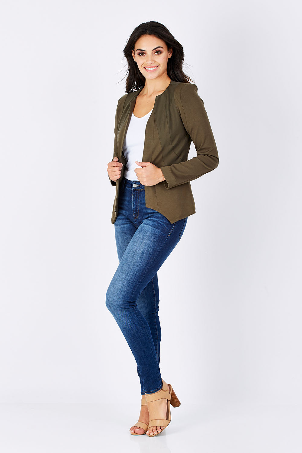 Model Monika wearing the Persuit Jacket in colour Khaki (Green), from the front, showing the whole outfit