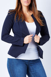 Model Laura wearing the Persuit Jacket in colour Navy (Blue), from the front, cropped image