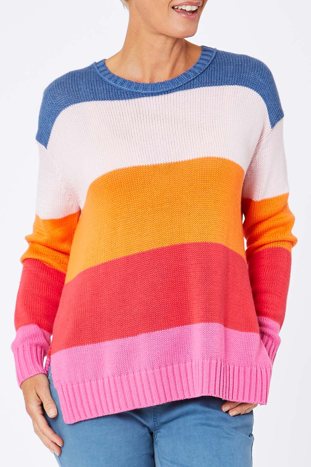 Model Amelia wearing size S of the Mega Stripe Pullover in colour Bubblegum (Pink), from the front, cropped image
