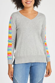 Model Olivia wearing size S of the Ladder Sleeve Jumper in colour Heathercom (Grey), from the front, cropped image