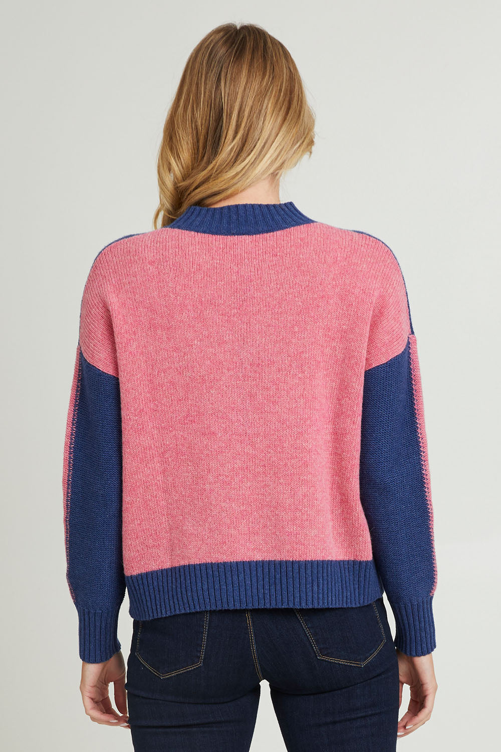 Model Grace wearing size S of the Colour Block Turtle in colour Denim (Blue), from the back