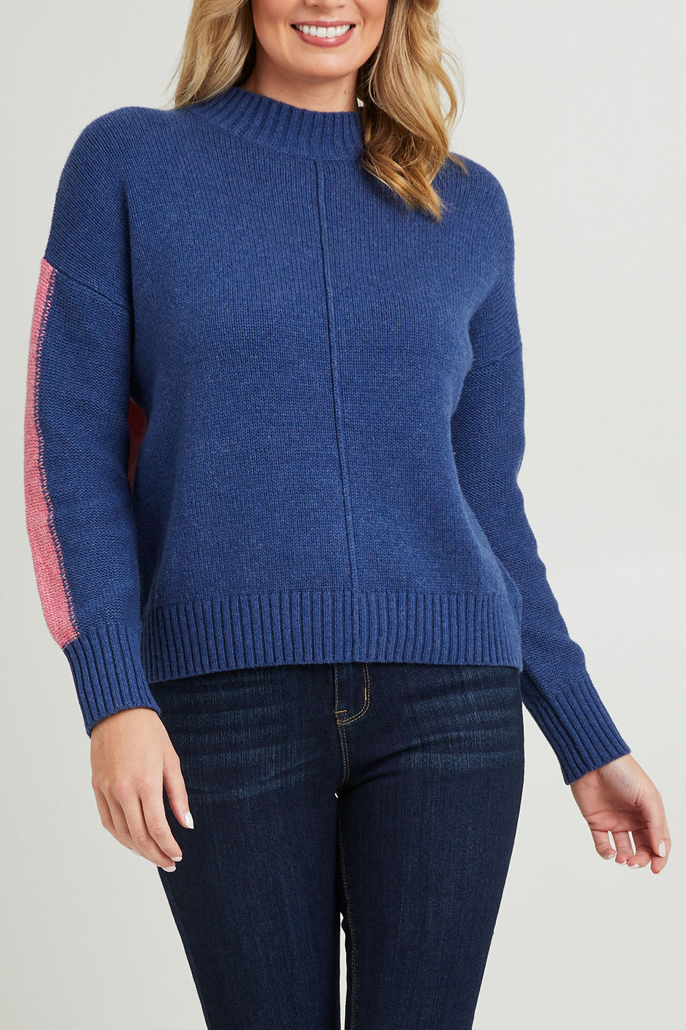Model Grace wearing size S of the Colour Block Turtle in colour Denim (Blue), from the front, cropped image