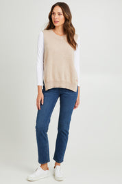 Model Madeline wearing size S of the Essential Vest in colour Oat, from the front, showing the whole outfit