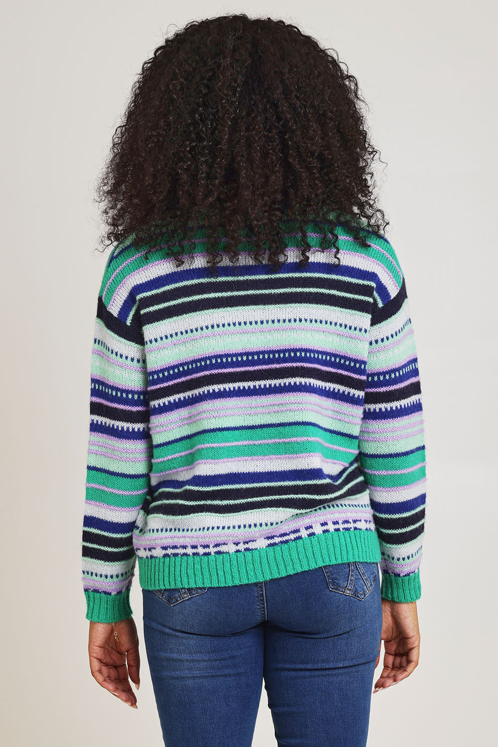 Model Ziara wearing size S of the Stripe Merino Jumper in colour Green (Green), from the back