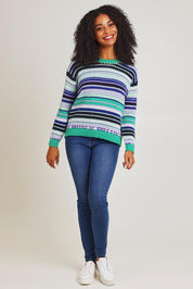 Model Ziara wearing size S of the Stripe Merino Jumper in colour Green (Green), from the front, showing the whole outfit