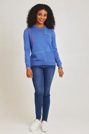 Model Ziara wearing size S of the Hancraft Cotton Cashmere Crew in colour Chambray (Blue), from the front, showing the whole outfit