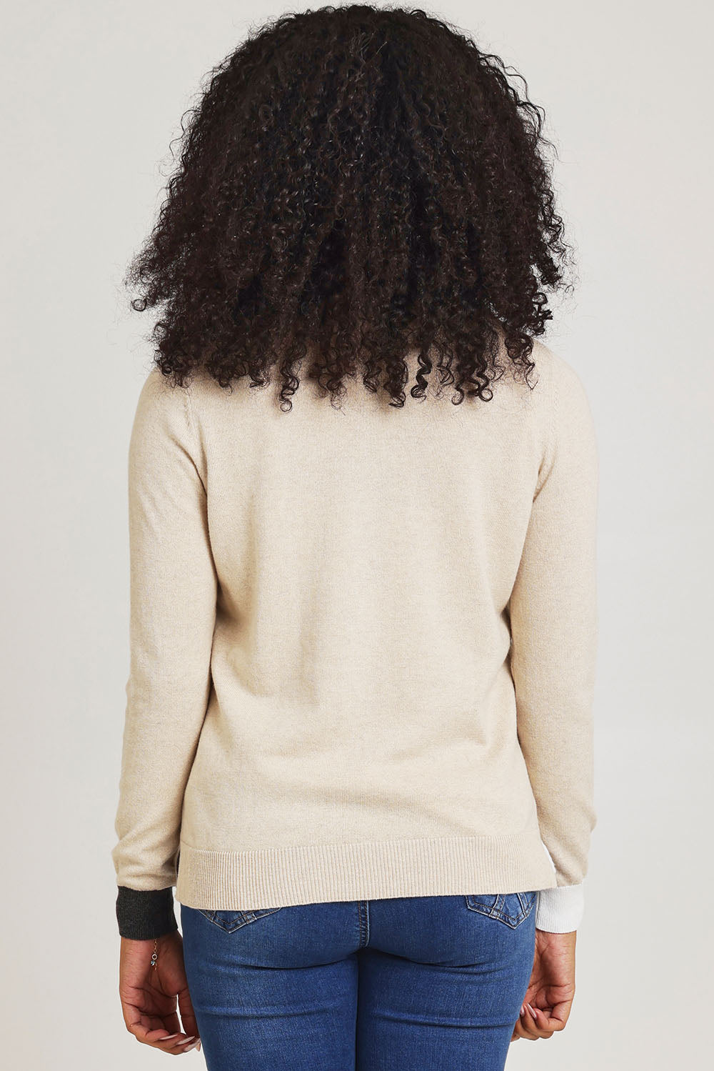 Model Ziara wearing size S of the Magestic Cotton Cashmere Crew in colour Oat, from the back