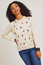 Model Ziara wearing size S of the Magestic Cotton Cashmere Crew in colour Oat, from the front, cropped image