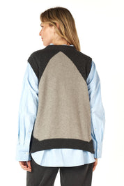 A model wearing the Diamond Dapper Cotton Cashmere Vest in colour Charcoal, from the back
