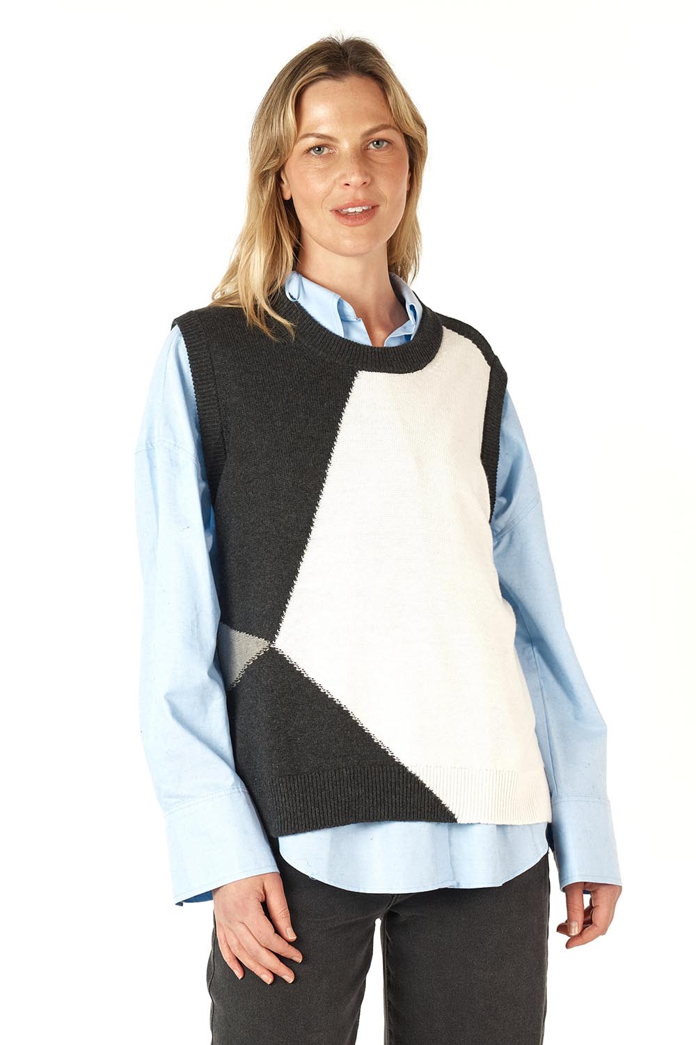 A model wearing the Diamond Dapper Cotton Cashmere Vest in colour Charcoal, from the front, cropped image