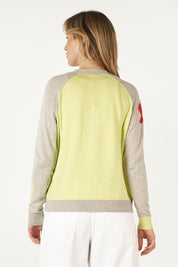 A model wearing the Happy Cotton Cashmere Cardi in colour Marl (Grey), from the back