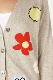 A model wearing the Happy Cotton Cashmere Cardi in colour Marl (Grey), from the front, cropped image