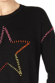 A model wearing the Super Star Cotton Cashmere Jumper in colour Black (Black), from the front, cropped image