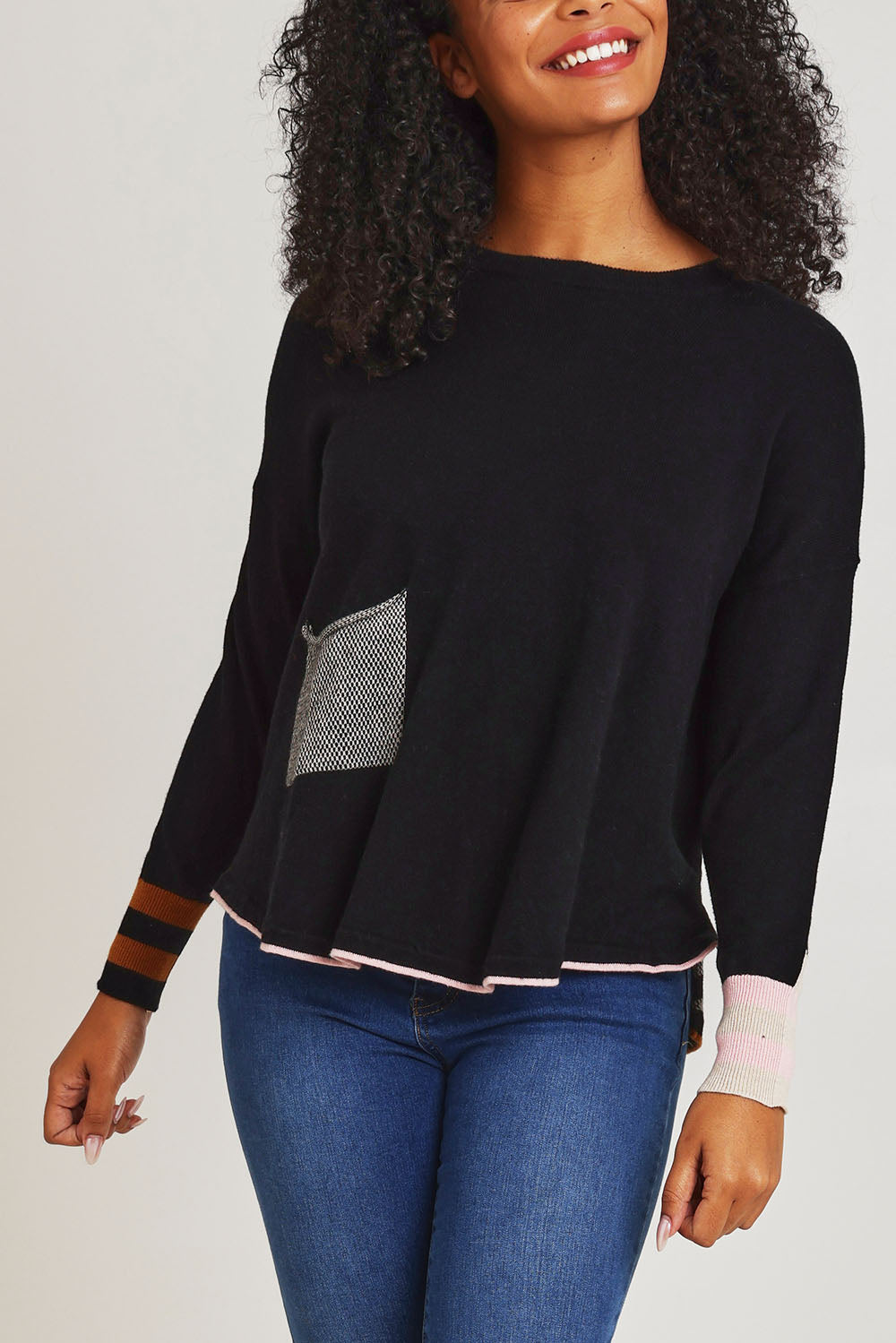 Model Ziara wearing size S of the Birdseye Cotton Cashmere Jumper in colour Black (Black), from the front, cropped image