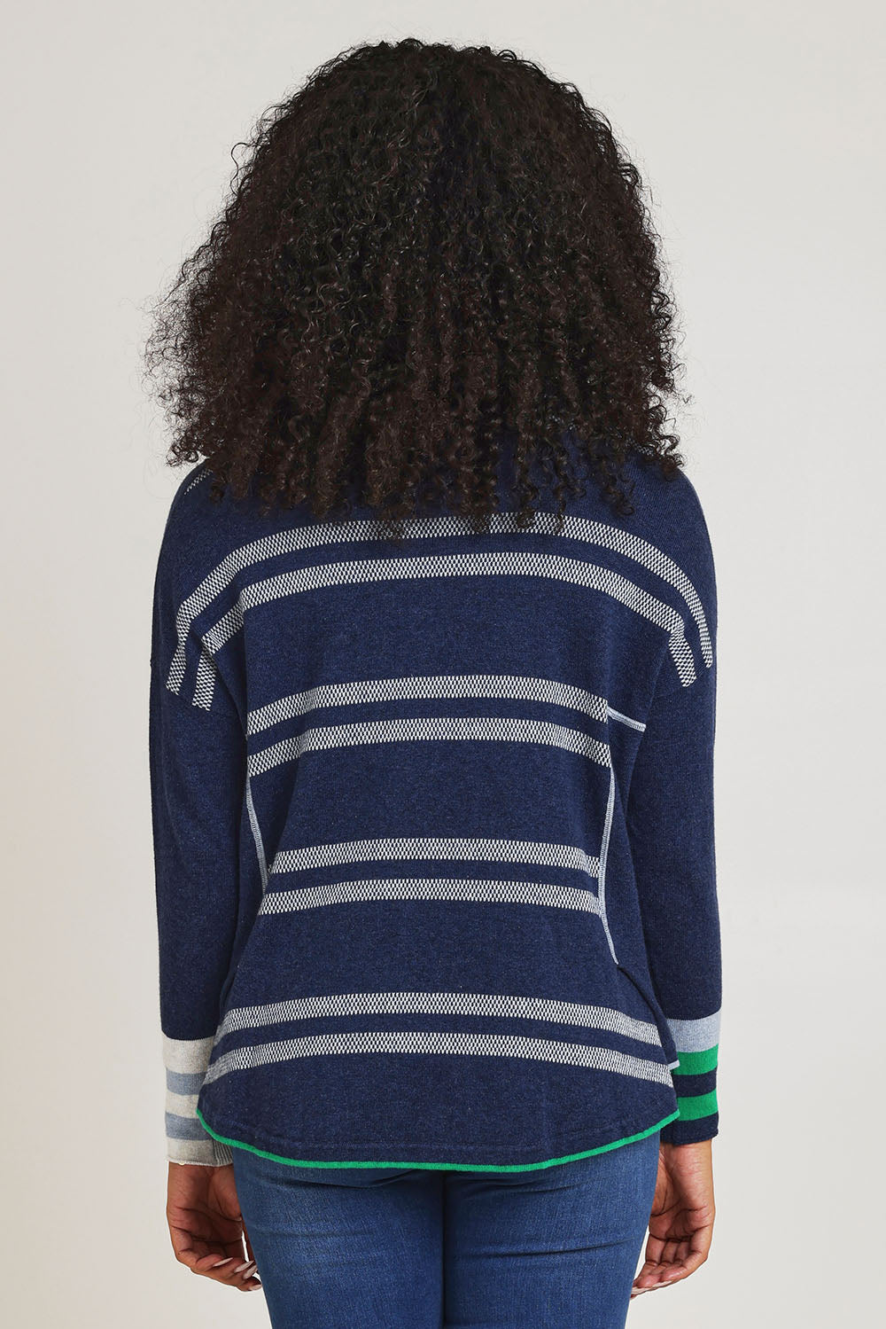 Model Ziara wearing size S of the Birdseye Cotton Cashmere Jumper in colour Denim (Blue), from the back