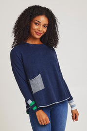 Model Ziara wearing size S of the Birdseye Cotton Cashmere Jumper in colour Denim (Blue), from the front, cropped image