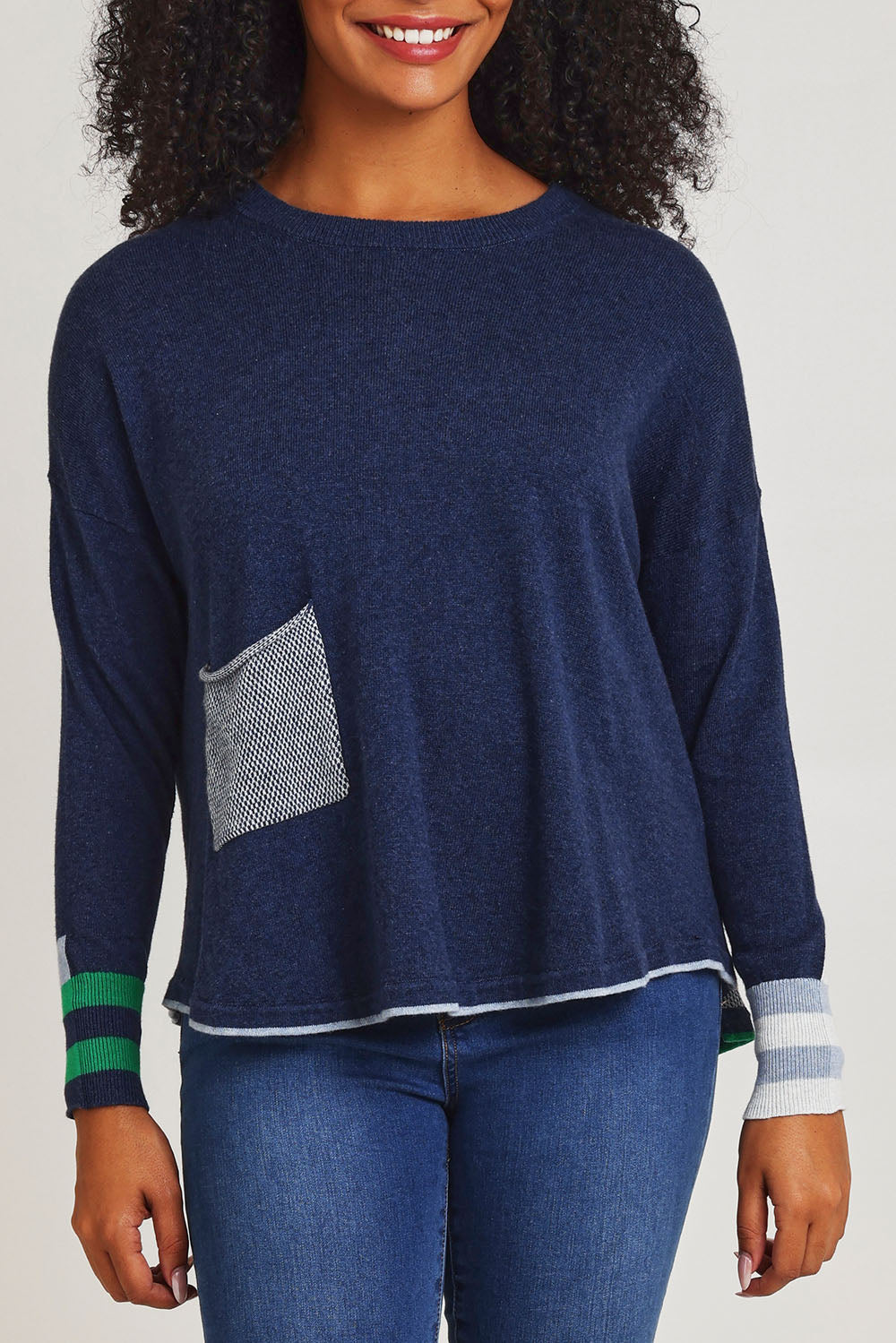 Model Ziara wearing size S of the Birdseye Cotton Cashmere Jumper in colour Denim (Blue), from the front, cropped image