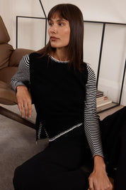 A model wearing the Essential Two Tone Cotton Cashmere Vest in colour Black (Black), from the front, showing the whole outfit