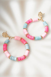 A model wearing size OneSize of the Ally Beaded Drop Earring in colour Pinkmulti (Pink), from the front, showing the whole outfit