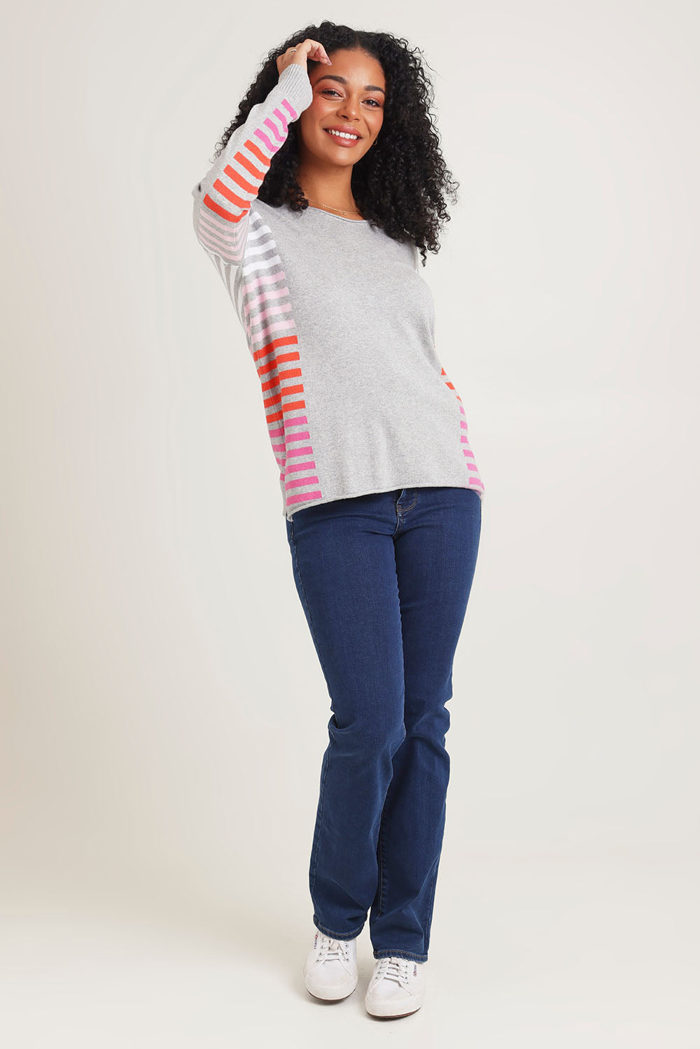 Model Ziara wearing size S of the Side Stripe Cotton Cashmere Jumper in colour Ltmarle (Grey), from the front, showing the whole outfit