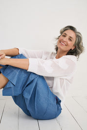 A model wearing the Hearts On My Sleeve Cotton Knit in colour White (White), from the front, showing the whole outfit
