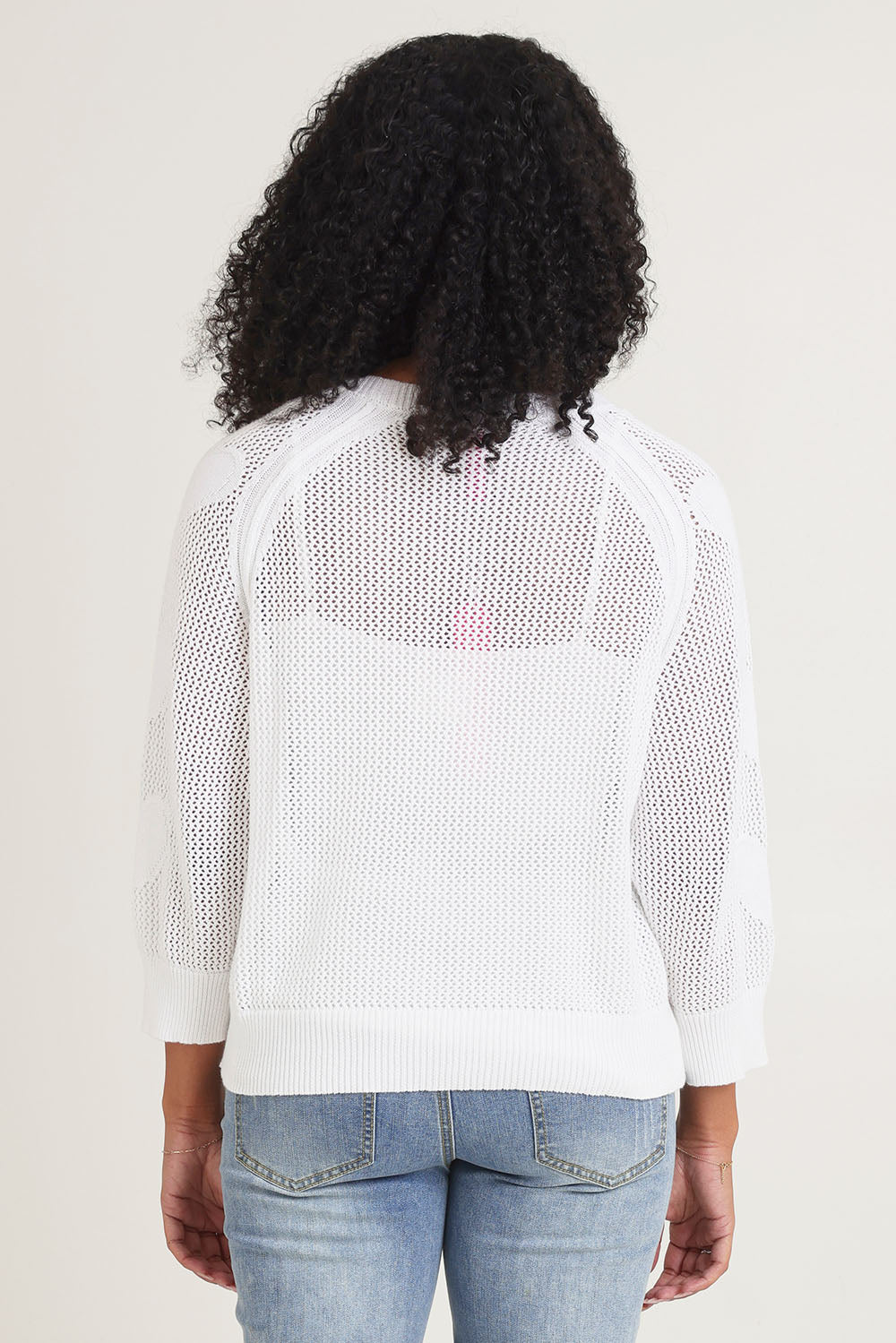 Model Ziara wearing size S of the Hearts On My Sleeve Cotton Knit in colour White (White), from the back