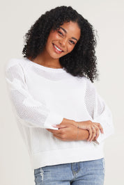 Model Ziara wearing size S of the Hearts On My Sleeve Cotton Knit in colour White (White), from the front, cropped image